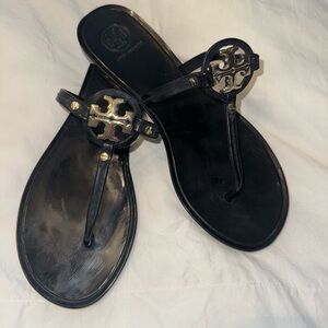 Tory Burch Black Thong Sandals with Gold Emblem